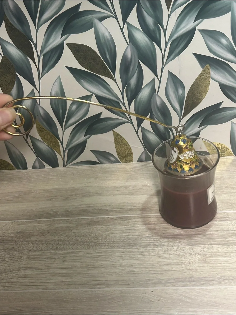 This is a Vintage Cloisonné Enamel Candle Snuffer.